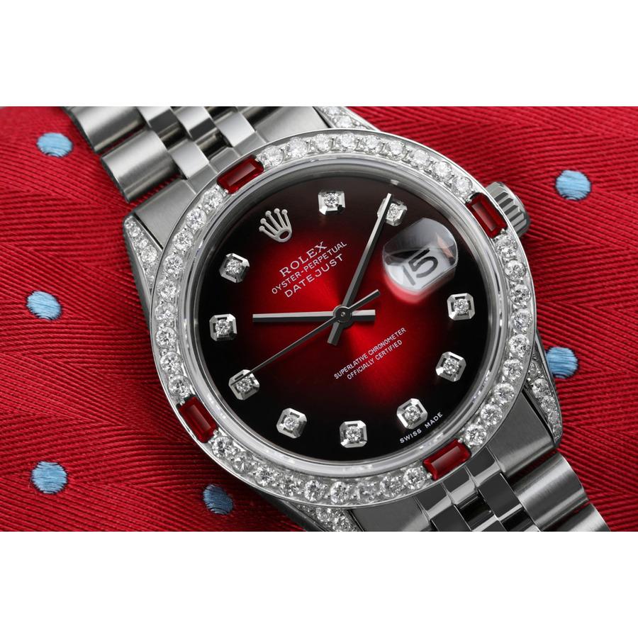 Montre Rolex Oyster Perpetual Datejust 36mm Cadran rouge avec diamants et lunette en rubis et diamants 16014.
Cette montre est dans un état comme neuf. Elle a été polie, entretenue et ne présente aucune rayure ou imperfection visible. Toutes nos