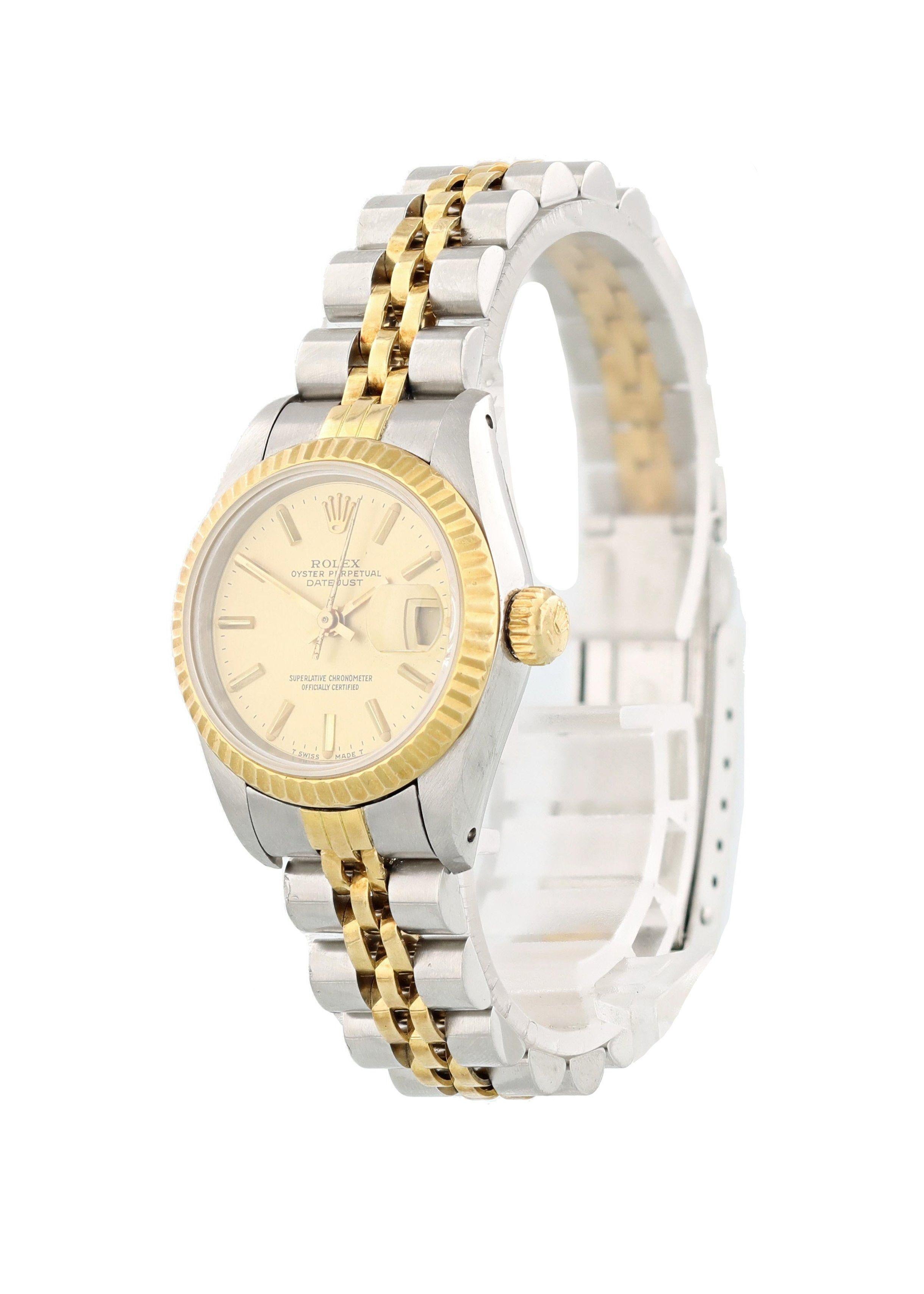Rolex Datejust Professional 69173 Ladies Watch. 
26mm Stainless Steel case. 
Yellow Gold Stationary bezel. 
Champagne dial with Luminous gold hands and index hour markers. 
Minute markers on the outer dial. 
Date display at the 3 o'clock position.