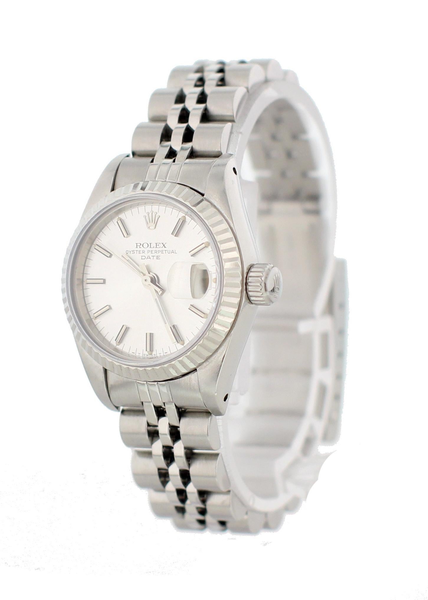 Rolex Oyster Perpetual Datejust 69174 Ladies Watch. 26mm stainless steel case. 18k white gold fluted bezel. Silver dial with steel hands and stick hands. Luminous hands and indexes. Date Display by the 3 o'clock. Stainless steel Jubilee band. Will