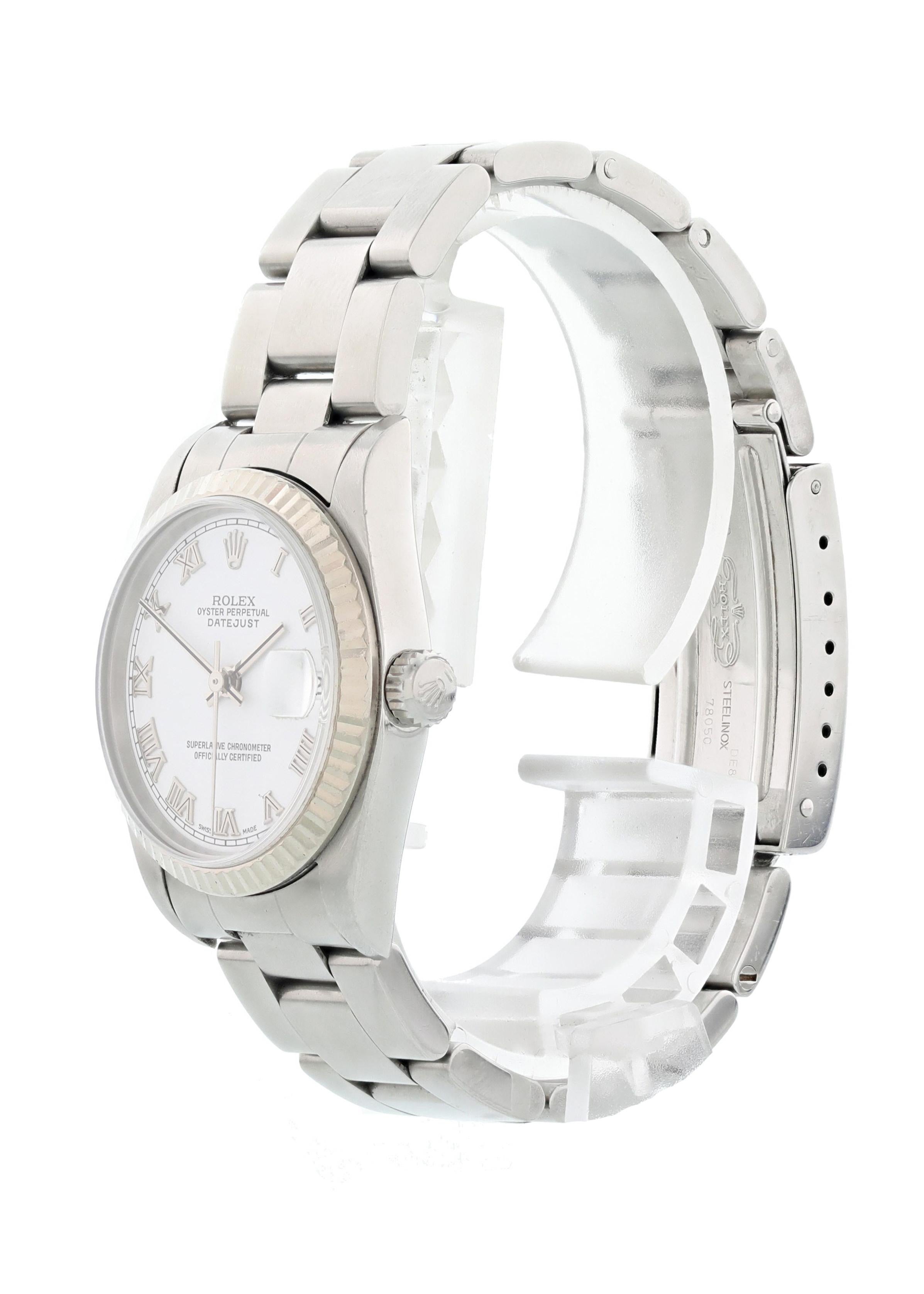 Rolex Oyster Perpetual Datejust 78274 Ladies Watch.  26mm Stainless steel case. 18K white gold fluted bezel. White dial with steel hands and Roman numeral markers. Quickset date display at the 3 o'clock position. Stainless steel jubilee bracelet