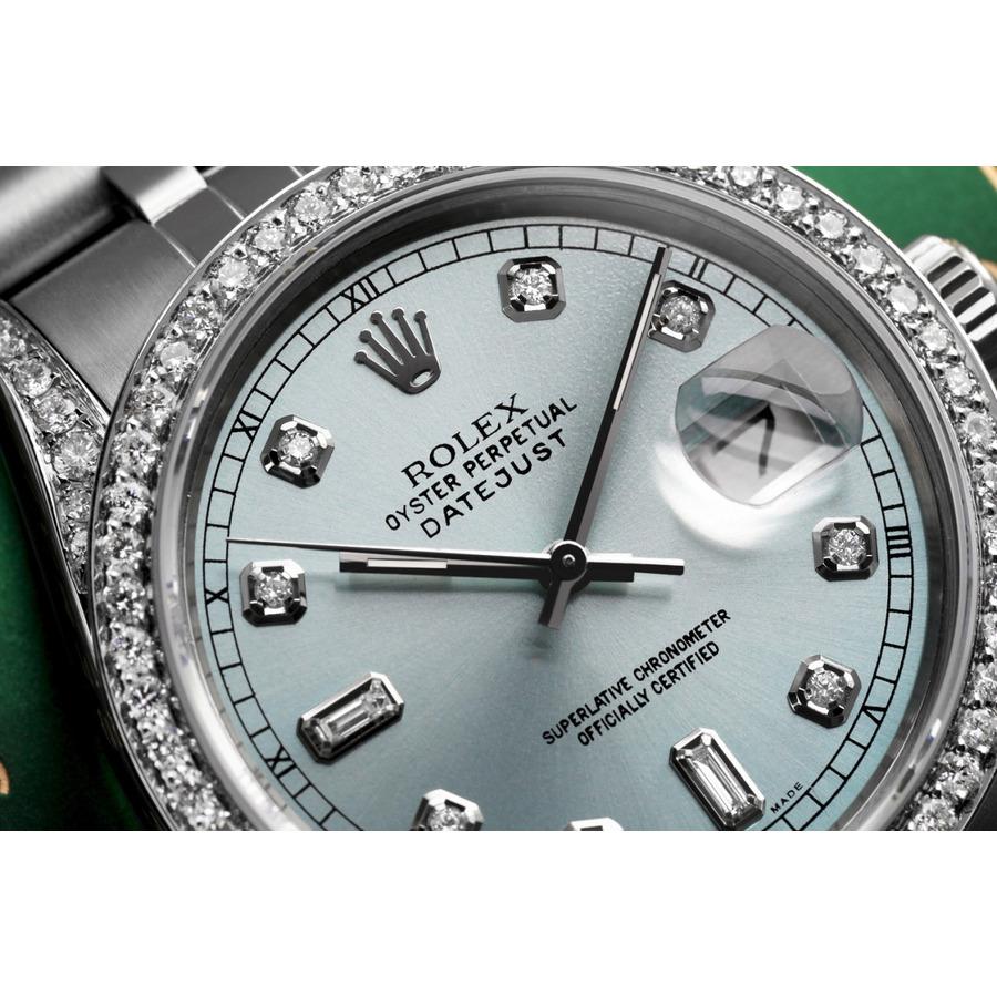 Rolex Oyster Perpetual Datejust Ice Blue Face with Baguette & Round Diamonds 36mm Watch 16014.
Cette montre est dans un état comme neuf. Elle a été polie, entretenue et ne présente aucune rayure ou imperfection visible. Toutes nos montres