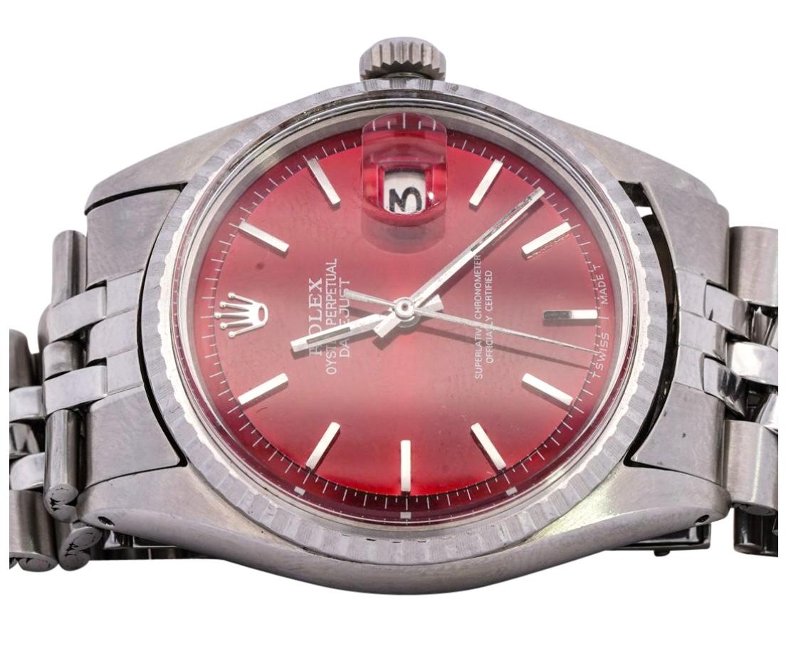 Handsome Rolex Oyster Perpetual stainless steel customized men's pre-owned wristwatch. The vintage Rolex Datejust features 1570 movement, 26 jewels and is a stunning Rolex classic. Stainless steel case is 36.0mm in diameter. Rolex logo on crown.