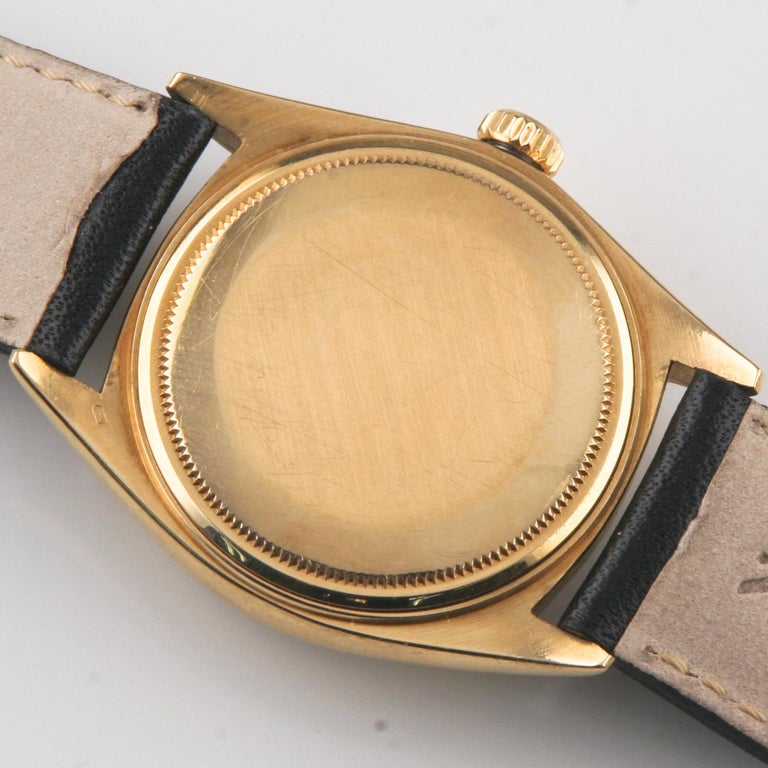 gold rolex day date leather strap