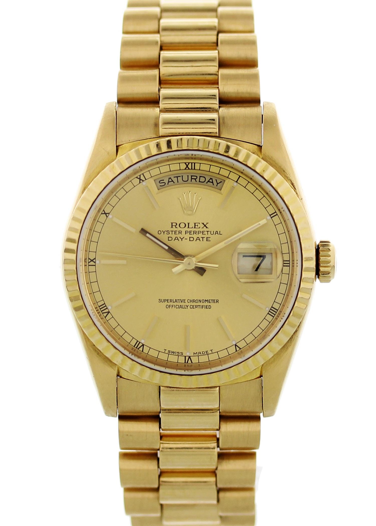 Rolex Oyster Perpetual Day-Date President 18238 Mens Watch. 36 mm 18k yellow gold case. 18k yellow gold stationary fluted bezel. Champagne dial luminous hands and indexes. Day display at 12 0'clock. Date display at 3 0'clock. Double quickset.