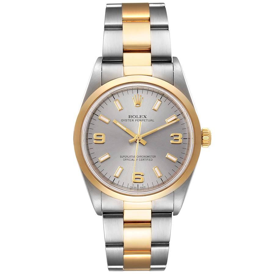 Rolex Oyster Perpetual Domed Bezel Steel Yellow Gold Mens Watch 14203. Officially certified chronometer self-winding movement. Stainless steel and 18K yellow gold oyster case 34.0 mm in diameter. Rolex logo on a crown. 18K yellow gold smooth domed