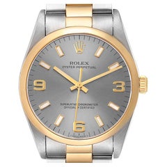 Rolex Montre Oyster Perpetual en or jaune et acier avec lunette en forme de dôme, pour hommes 14203