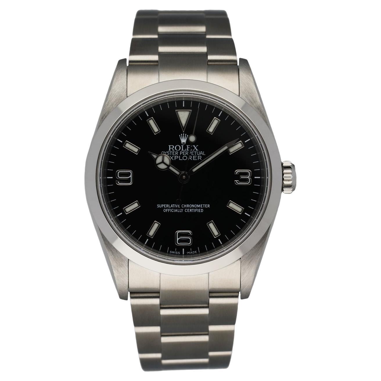 Rolex Oyster Perpetual Explorer 114270 Men
s Watch Box 
Papers