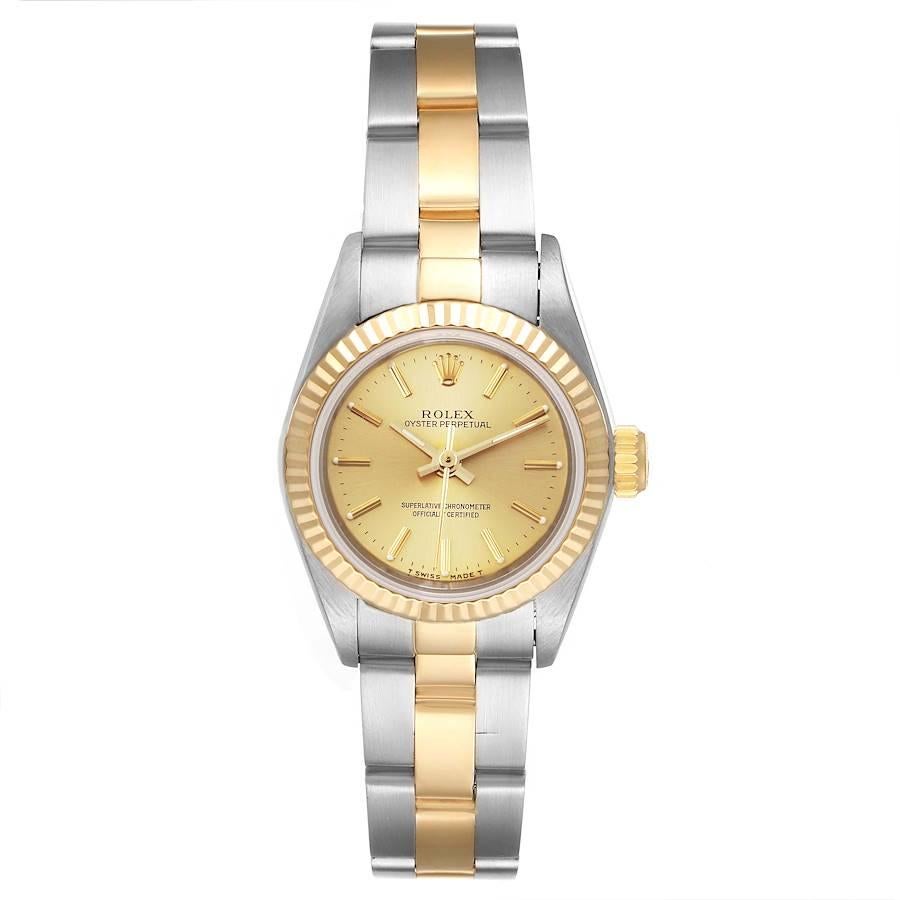 Rolex Oyster Perpetual Fluted Bezel Steel Yellow Gold Ladies Watch 67193. Officially certified chronometer self-winding movement. Stainless steel oyster case 24.0 mm in diameter. Rolex logo on a 18k yellow gold crown. 18k yellow gold fluted bezel.