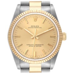 Rolex Oyster Perpetual Fluted Bezel Steel Yellow Gold Mens Watch 14233