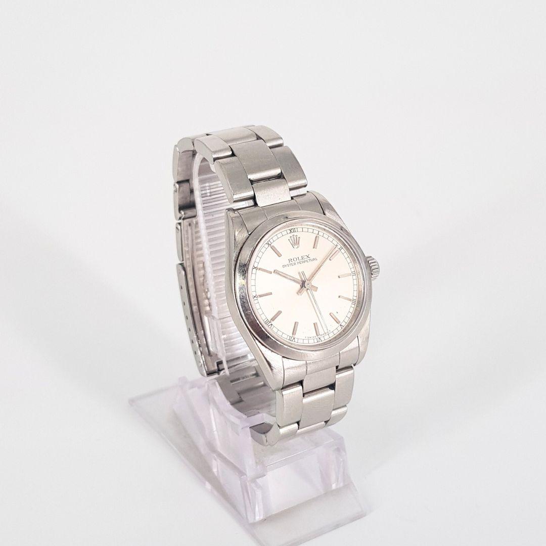 Exquisite
GENDER:  Unisex
MOVEMENT: Automatic
CASE MATERIAL: Steel 
DIAL: 31mm
DIAL COLOUR: Silver
STRAP:  55mm
BRACELET MATERIAL: Steel
CONDITION: 8/10 
MODEL NUMBER: 77080
SERIAL NUMBER: A354439
YEAR: UNKNOWN
BOX – No
PAPERS – No
