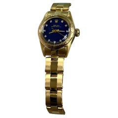 Rolex Oyster Perpetual Damen 18K Gelbgold 67198 Blaues Diamant-Zifferblatt