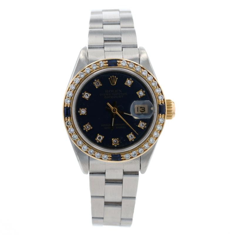 This is an authentic Rolex wristwatch. The watch has been professionally serviced and comes with a one-year warranty along with a generic black presentation box. 

Brand: Rolex Oyster Perpetual Datejust 
Model Number: 69173
Year: 1991
Metal Content: