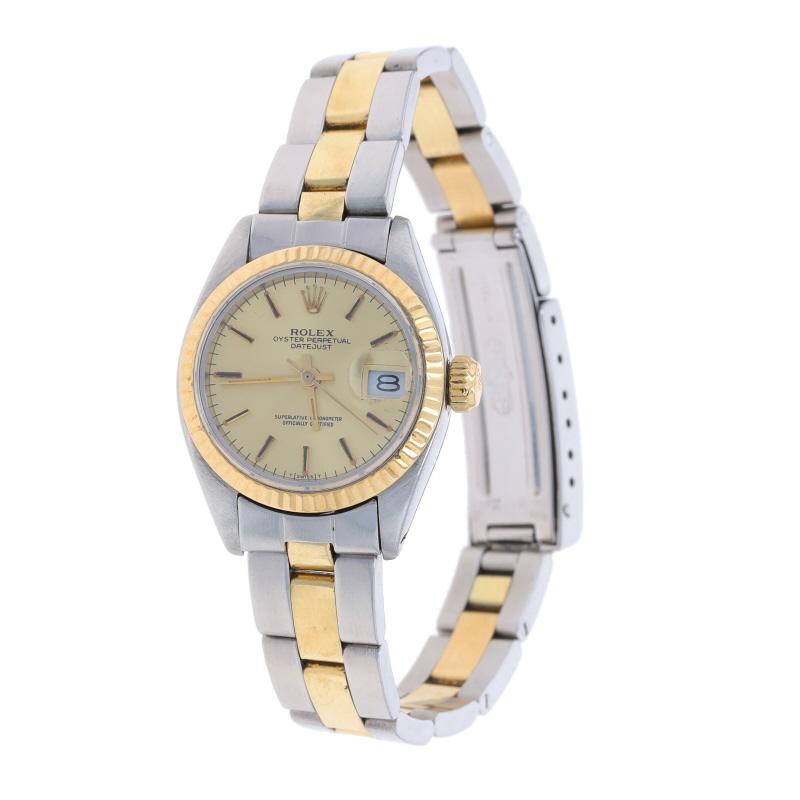 Marke: Rolex
Modell: Oyster Perpetual
Modellnummer: 6916
Uhrwerk: Automatik
Jahr: 1979
Uhrwerk-Hersteller: Schweiz
Zifferblattfarbe: Champagner
Garantie: Ein Jahr

Metall Inhalt: Rostfreier Stahl & 18k Gelbgold

Verschluss-Typ: