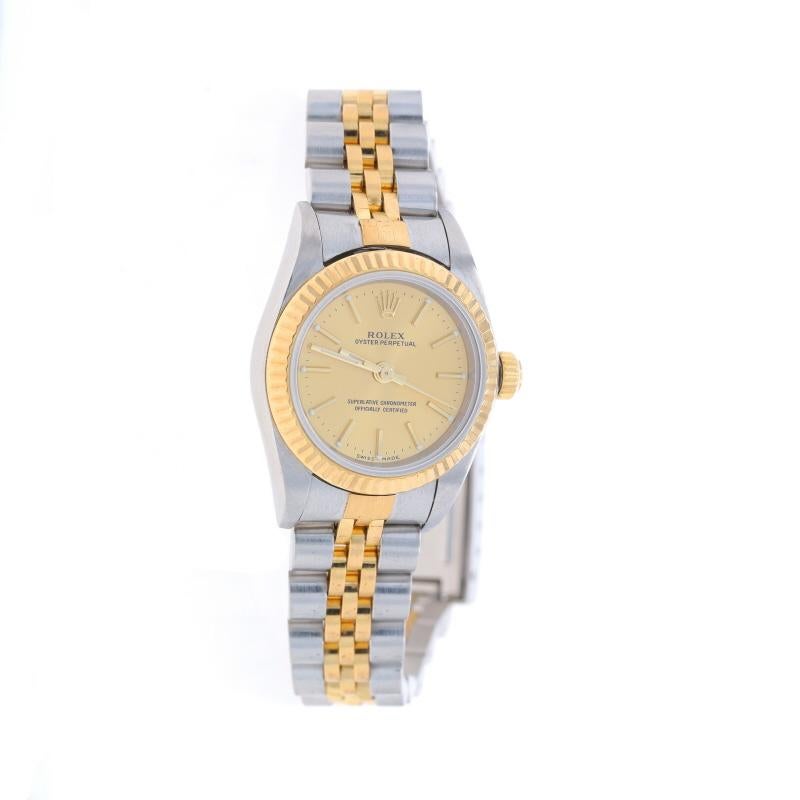 Brand: Rolex
Model: Oyster Perpetual
Model Number: 76193
Movement: Automatic
Warranty: One Year
Year: 2002
Movement Maker: Swiss
Dial Color: Champagne

Metal Content: Stainless Steel & 18k Yellow Gold

Fastening Type: Fold-Over Clasp
Features:
