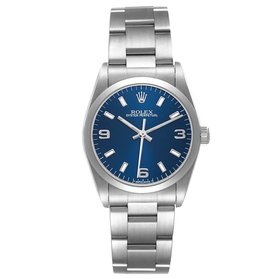 Rolex Oyster Perpetual Midsize 31mm Blue Dial Steel Ladies Watch 77080 Box Paper. Officially certified chronometer automatic self-winding movement. Stainless steel oyster case 31 mm in diameter. Rolex logo on the crown. Stainless steel smooth bezel.