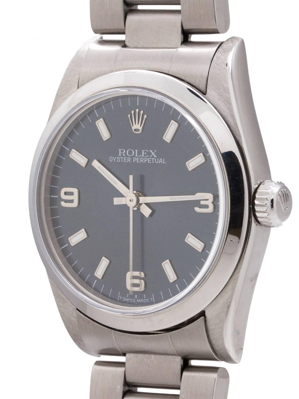 
Rolex Oyster Perpetual ref 67480 midsize model serial # U6 circa 1997. Featuring 31mm diameter midsize case, smooth bezel, sapphire crystal, and original blue Explorer style dial with luminous indexes and hands. Powered by self winding movement