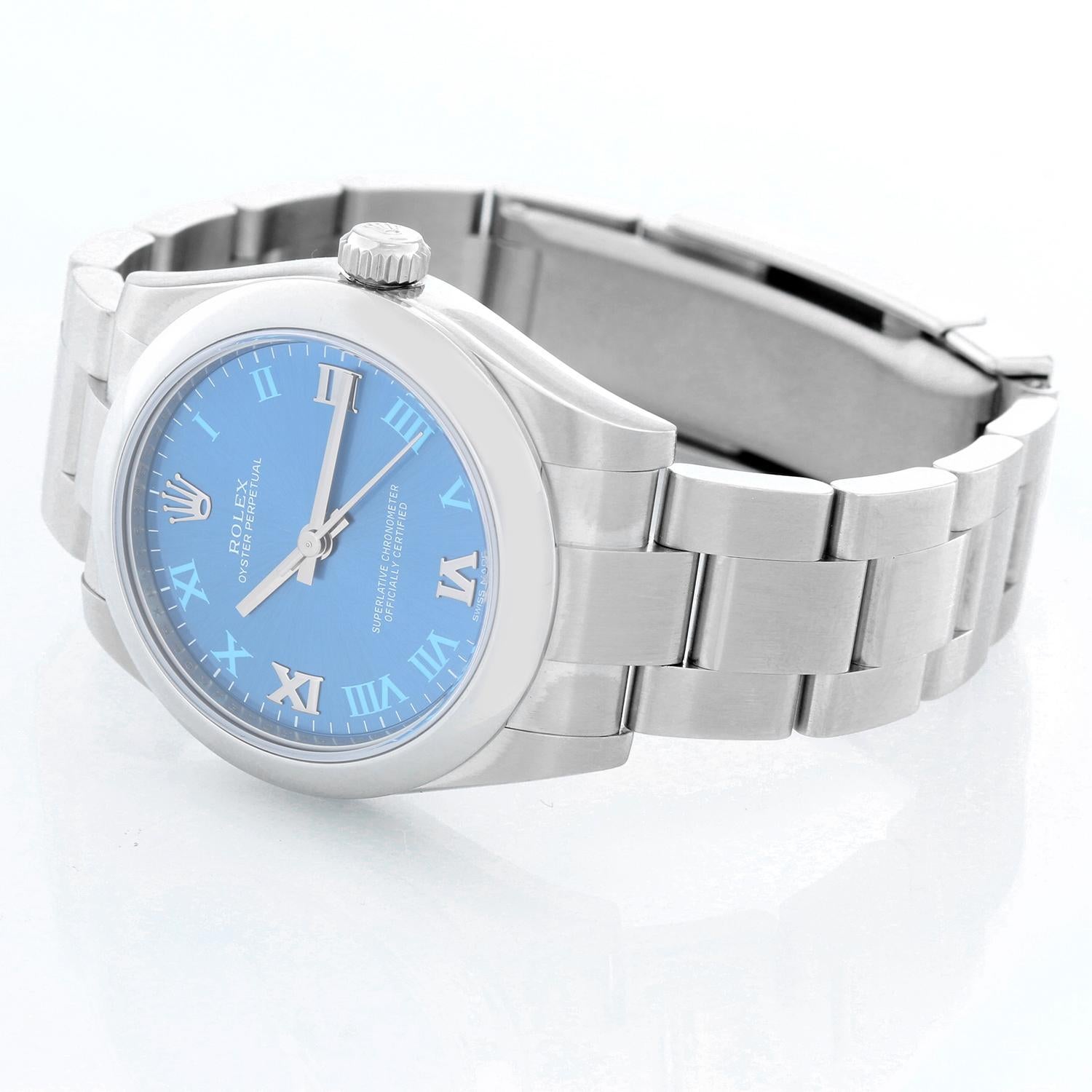 Rolex Oyster Perpetual No-Date Blue Dial Midsize Steel Watch 177200 - Automatic winding. Stainless steel case with smooth bezel ( 31 mm). Blue dial with Roman numerals. Stainless steel Oyster bracelet. Pre-owned with custom box and card. Dated 2014. 