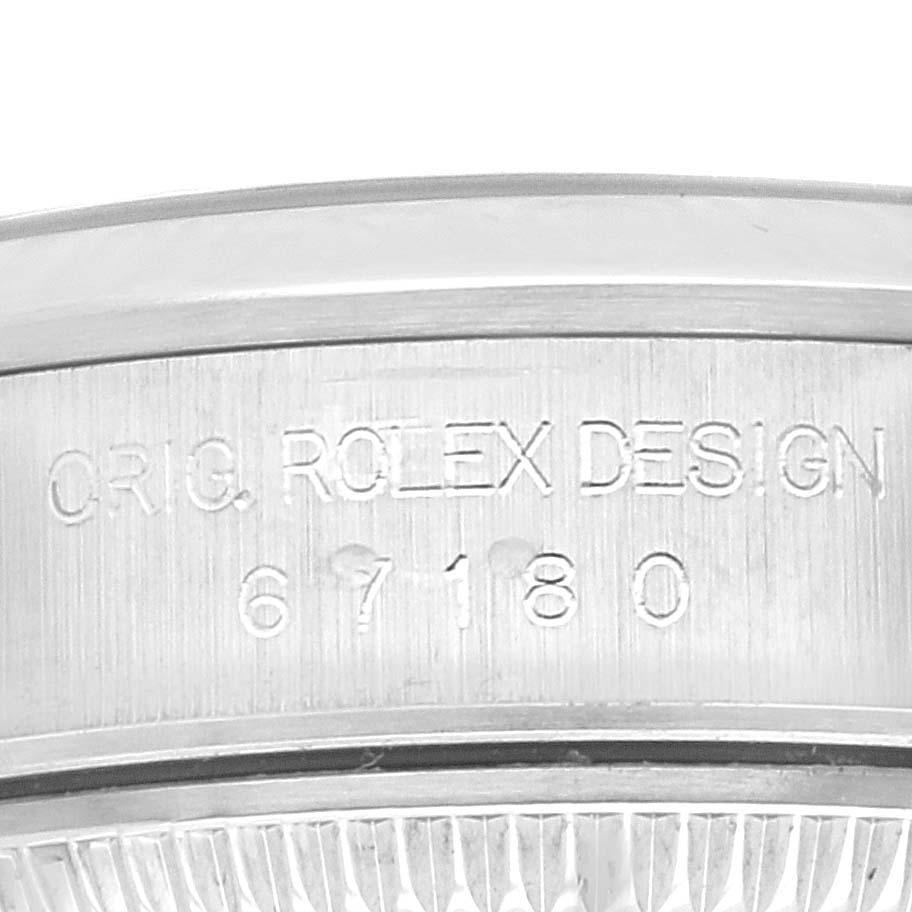Rolex Oyster Perpetual Non Date Blue Dial Steel Ladies Watch 67180 Box Papers. Mouvement automatique à remontage automatique, officiellement certifié chronomètre. Boîtier oyster en acier inoxydable de 24.0 mm de diamètre. Logo Rolex sur la couronne.