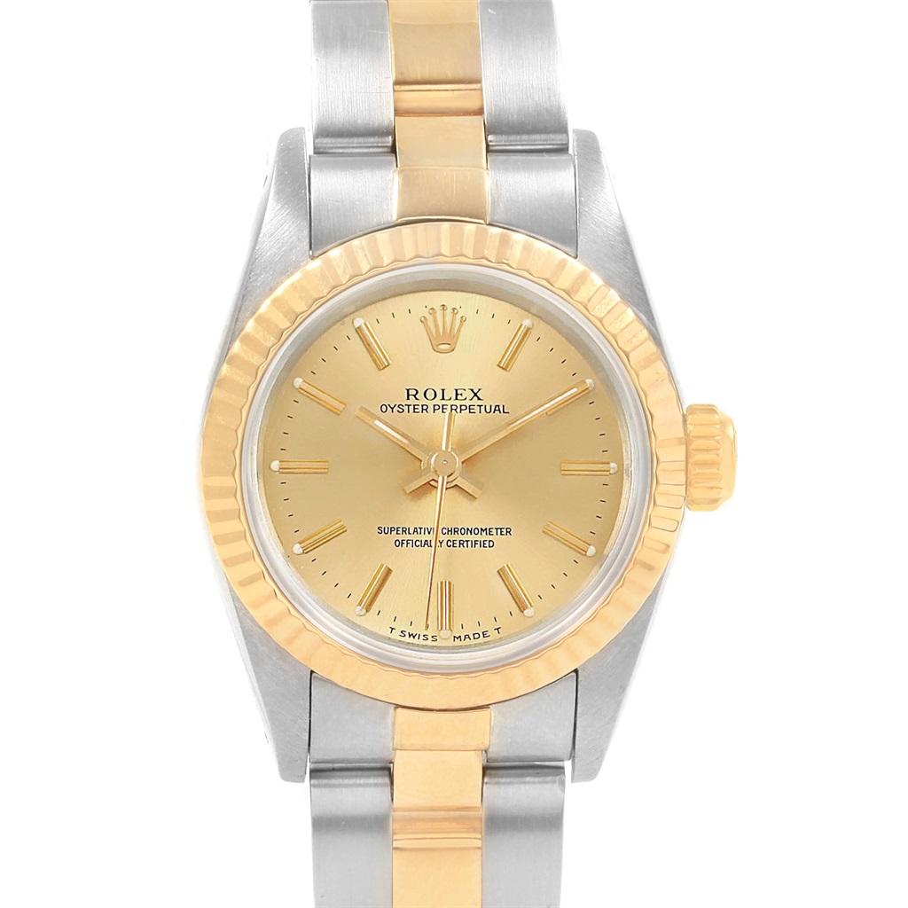 Rolex Oyster Perpetual NonDate Steel Yellow Gold Ladies Watch 67193. Officially certified chronometer self-winding movement. Stainless steel oyster case 24.0 mm in diameter. Rolex logo on a 18k yellow gold crown. 18k yellow gold fluted bezel.