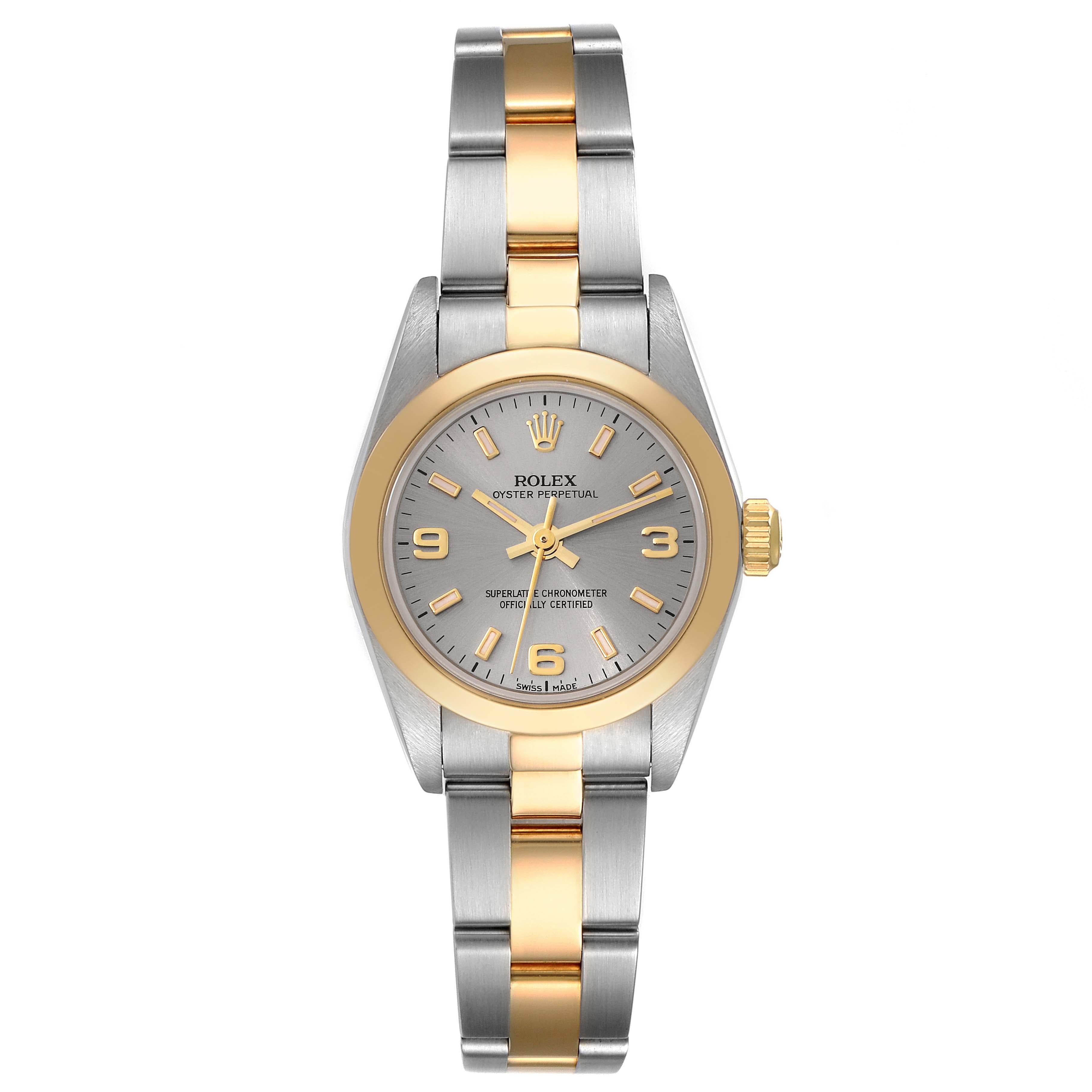 Rolex Oyster Perpetual Non-Date Steel Yellow Gold Ladies Watch 76183. Officially certified chronometer self-winding movement. Stainless steel oyster case 24.0 mm in diameter. Rolex logo on an 18k yellow gold crown. 18k yellow gold smooth bezel.