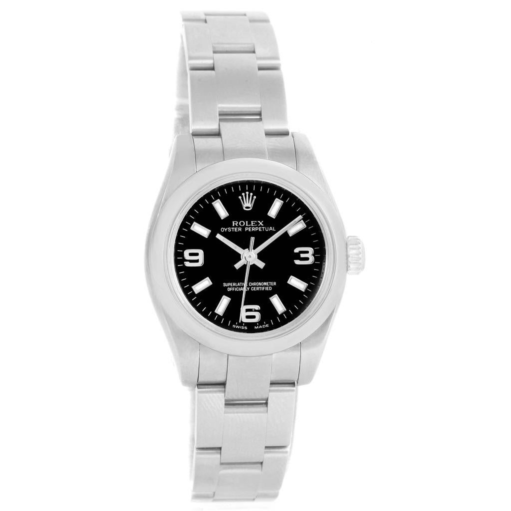 Rolex Oyster Perpetual Nondate Black Dial Ladies Watch 176200. Officially certified chronometer self-winding movement. Stainless steel oyster case 24 mm in diameter. Rolex logo on a crown. Stainless steel smooth domed bezel. Scratch resistant
