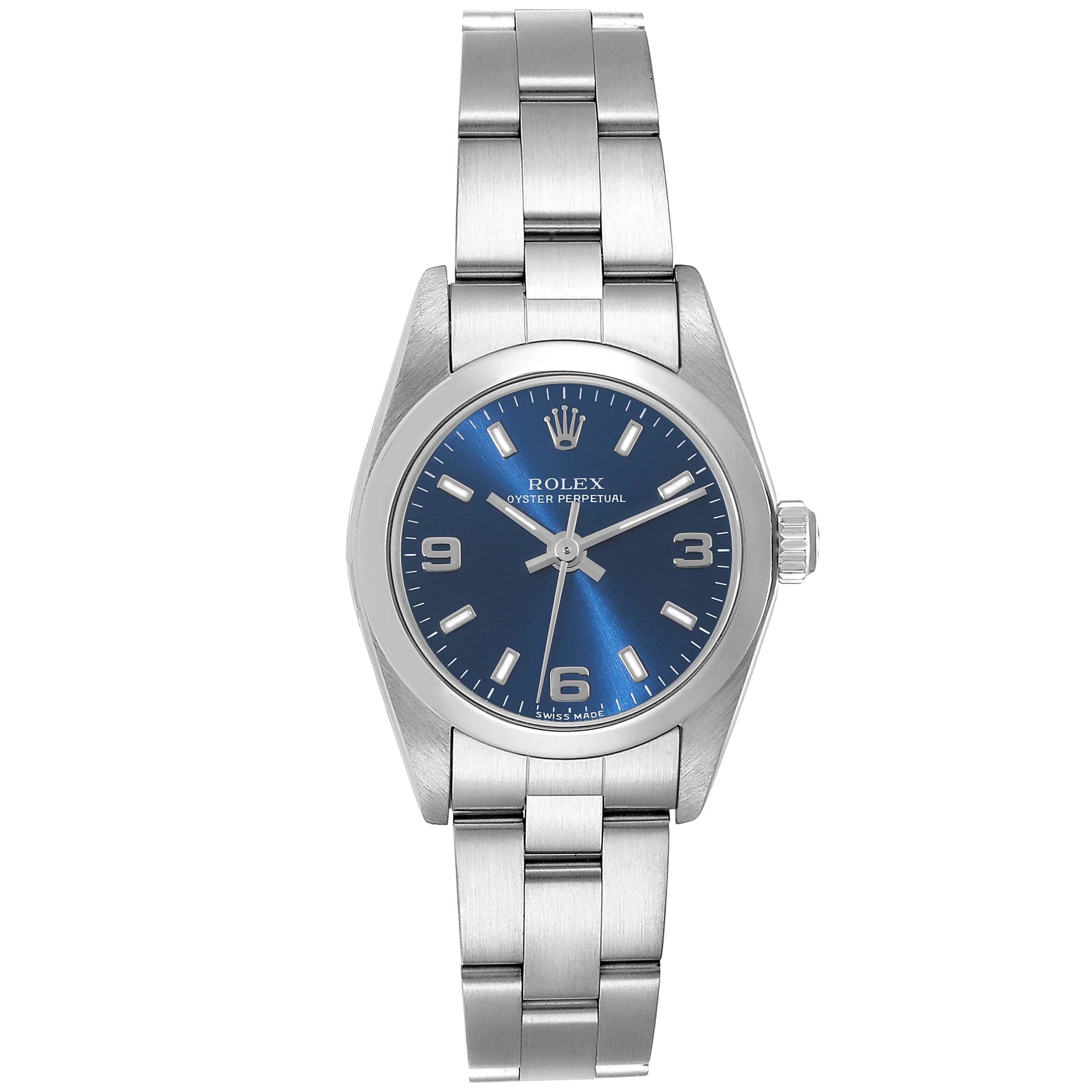 Rolex Oyster Perpetual Nondate Blue Dial Steel Ladies Watch 76080. Officially certified chronometer self-winding movement. Stainless steel oyster case 24.0 mm in diameter. Rolex logo on a crown. Stainless steel smooth domed bezel. Scratch resistant