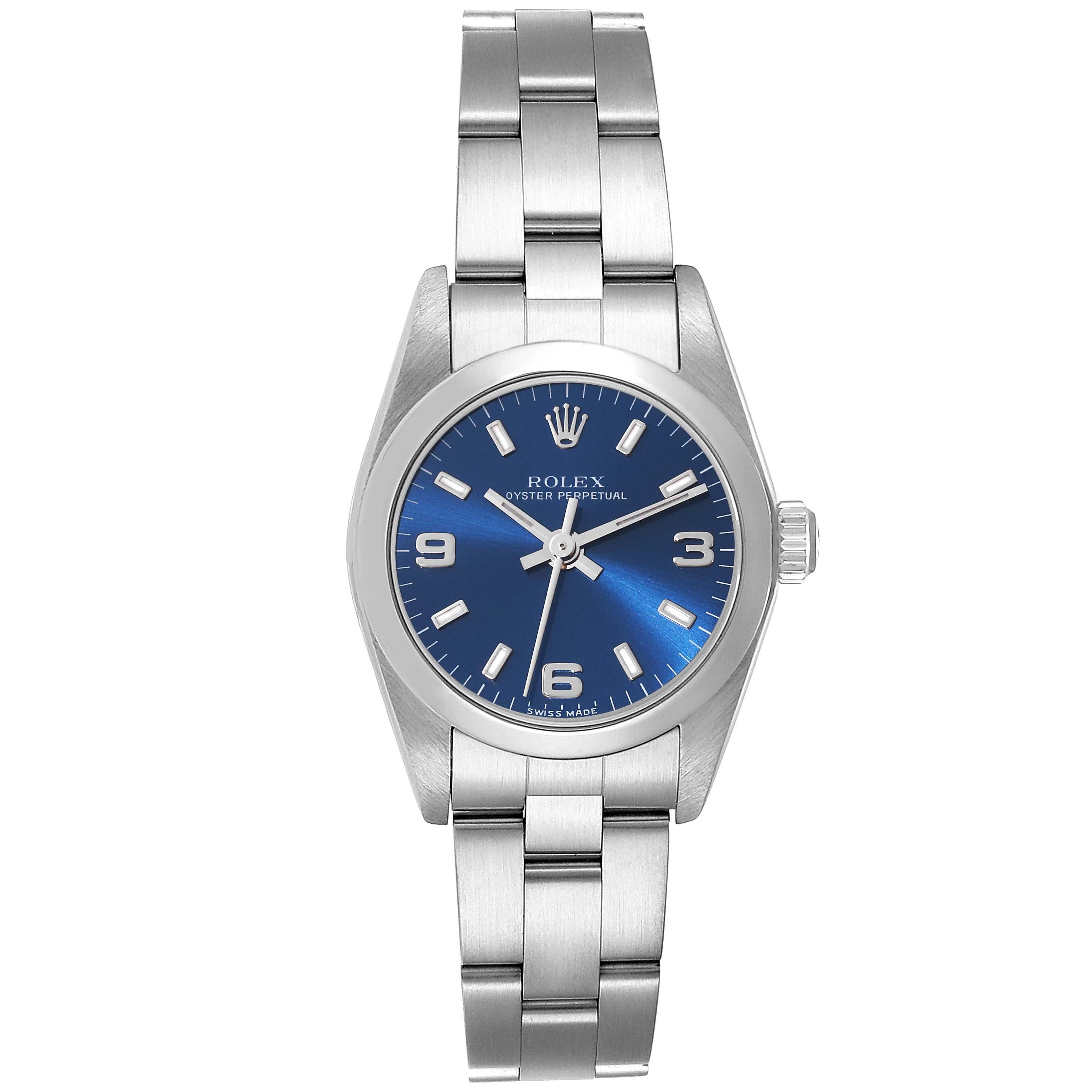 Rolex Oyster Perpetual Nondate Blue Dial Steel Ladies Watch 76080. Officially certified chronometer automatic self-winding movement. Stainless steel oyster case 24.0 mm in diameter. Rolex logo on a crown. Stainless steel smooth domed bezel. Scratch