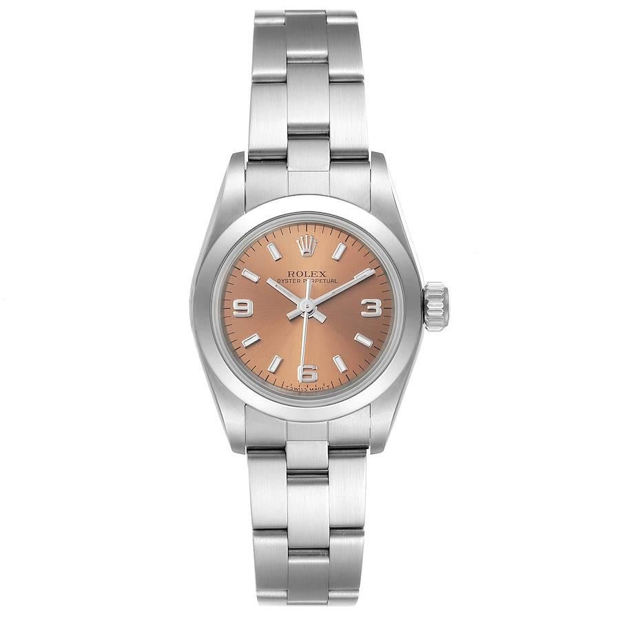 Rolex Oyster Perpetual Nondate Ladies Steel Salmon Dial Watch 67180. Officially certified chronometer self-winding movement. Stainless steel oyster case 24.0 mm in diameter. Rolex logo on a crown. Stainless steel smooth domed bezel. Scratch