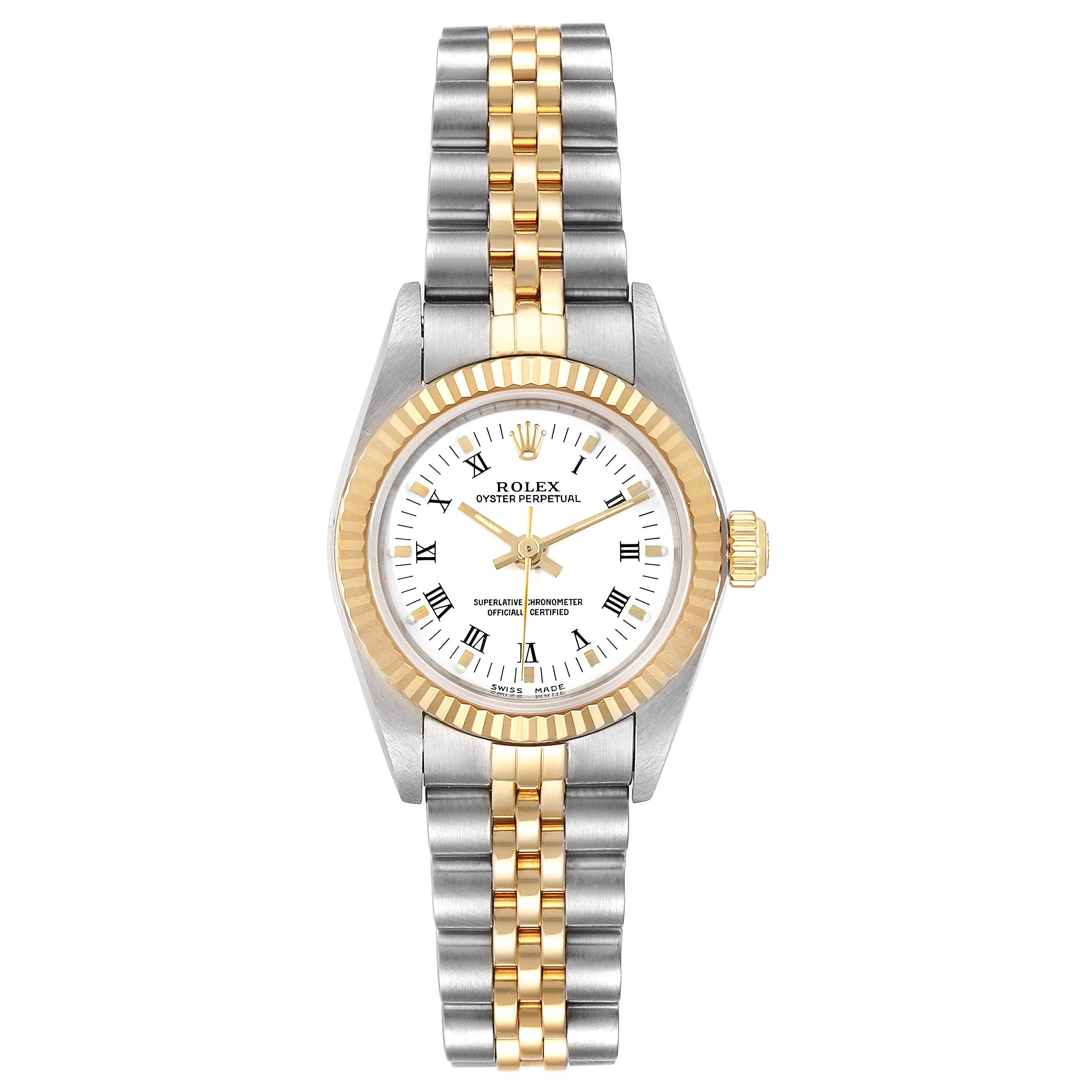 Rolex Oyster Perpetual NonDate Ladies Steel Yellow Gold Watch 76193. Officially certified chronometer self-winding movement. Stainless steel oyster case 24.0 mm in diameter. Rolex logo on a 18k yellow gold crown. 18k yellow gold fluted bezel.