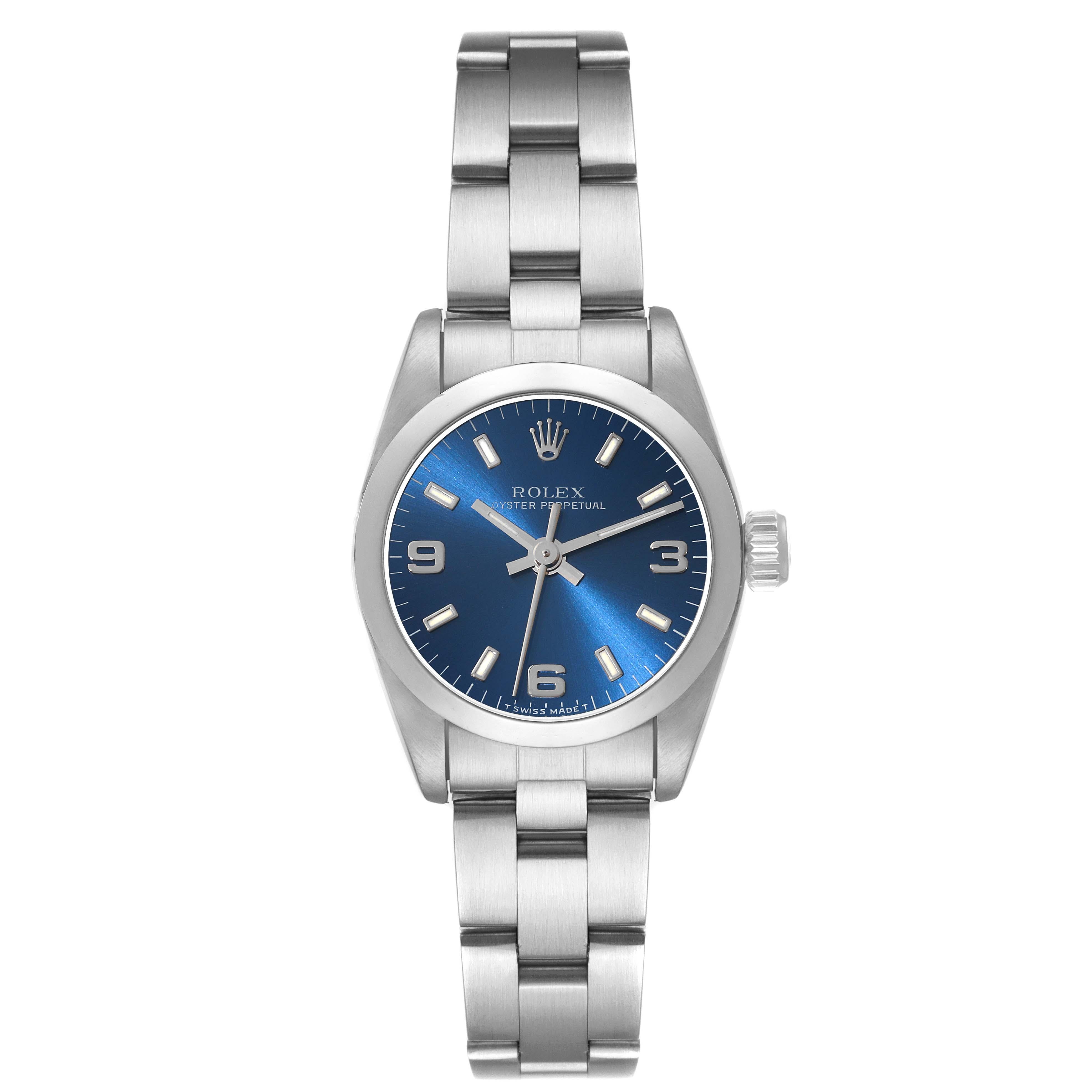Rolex Oyster Perpetual Nondate Steel Blue Dial Ladies Watch 67180. Officially certified chronometer automatic self-winding movement. Stainless steel oyster case 24.0 mm in diameter. Rolex logo on a crown. Stainless steel smooth domed bezel. Scratch