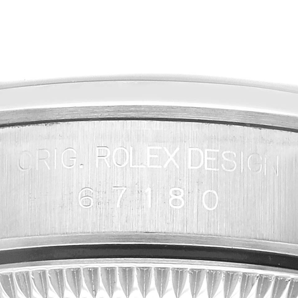 Rolex Oyster Perpetual Nondate Steel Salmon Dial Ladies Watch 67180. Officially certified chronometer automatic self-winding movement. Stainless steel oyster case 24.0 mm in diameter. Rolex logo on the crown. Stainless steel smooth domed bezel.