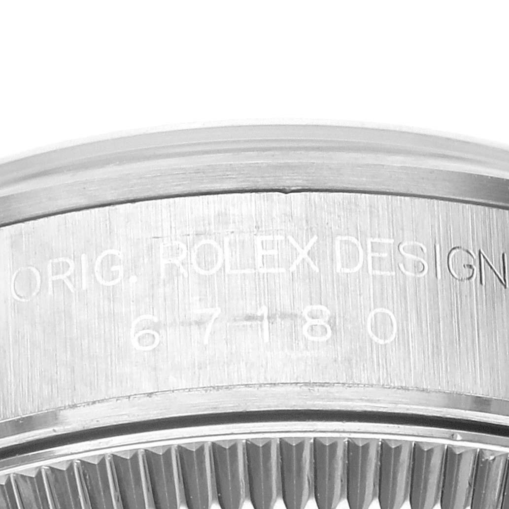 Rolex Oyster Perpetual Nondate Steel Salmon Dial Ladies Watch 67180. Mouvement automatique à remontage automatique, officiellement certifié chronomètre. Boîtier oyster en acier inoxydable de 24.0 mm de diamètre. Logo Rolex sur la couronne. Lunette
