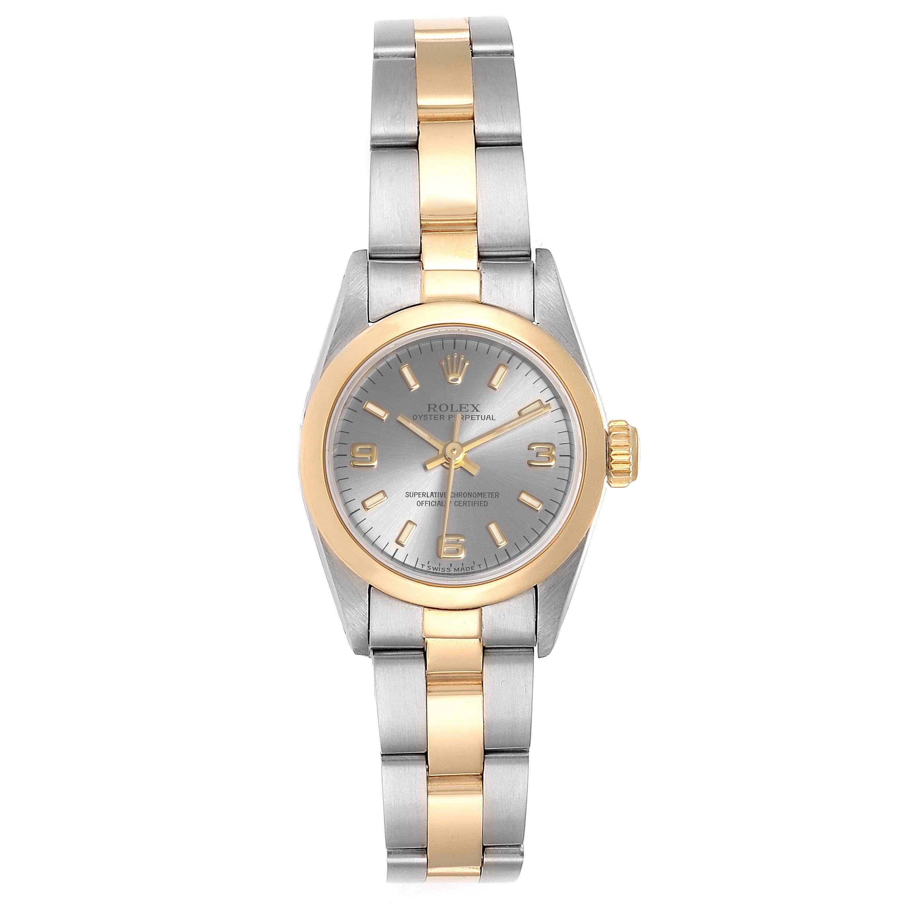 Rolex Oyster Perpetual NonDate Steel Yellow Gold Ladies Watch 67183. Officially certified chronometer self-winding movement. Stainless steel oyster case 24.0 mm in diameter. Rolex logo on a 18k yellow gold crown. 18k yellow gold smooth bezel.