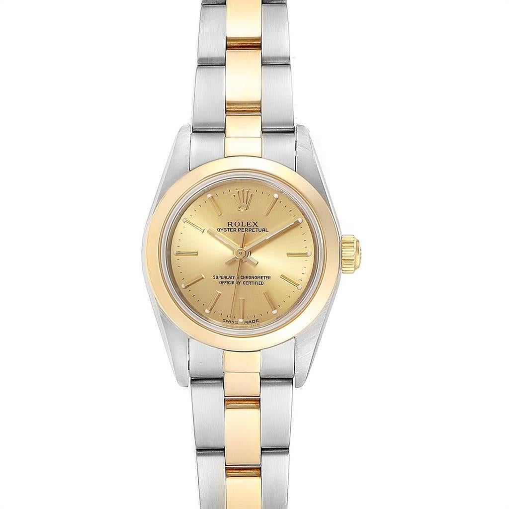 Rolex Oyster Perpetual nonDate Steel Yellow Gold Ladies Watch 76183. Officially certified chronometer self-winding movement. Stainless steel oyster case 24.0 mm in diameter. Rolex logo on a 18k yellow gold crown. 18k yellow gold smooth bezel.