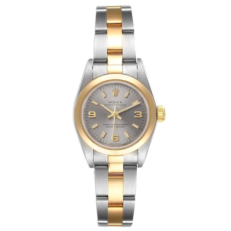 Rolex Oyster Perpetual Nondate Steel Yellow Gold Ladies Watch 76183. Officially certified chronometer self-winding movement. Stainless steel oyster case 24.0 mm in diameter. Rolex logo on a 18k yellow gold crown. 18k yellow gold smooth bezel.
