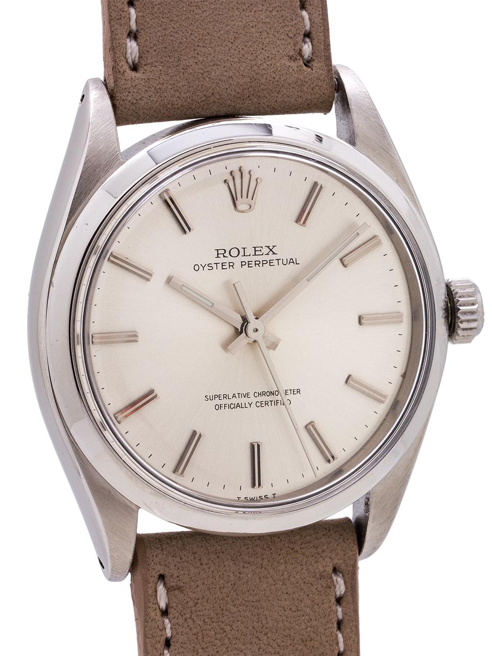 
Vintage Rolex Oyster Perpetual ref 1002 circa 1966. Featuring a 34mm diameter case with smooth bezel, acrylic crystal, and original silver satin dial with applied silver indexes and silver baton hands. Powered by caliber 1570 chronometer rated self