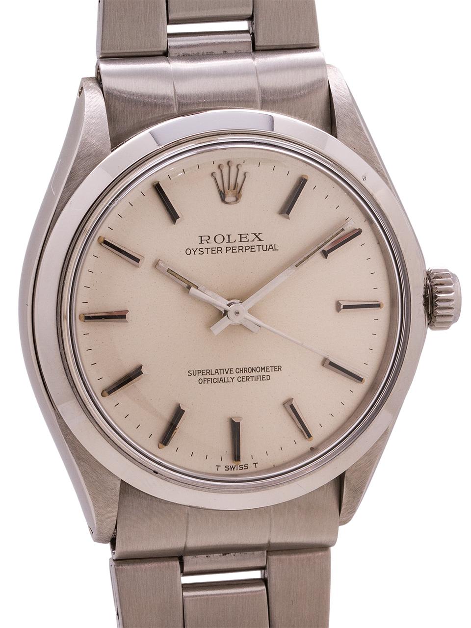 
Vintage Rolex Oyster Perpetual ref 1002 circa 1971. Featuring 34mm diameter case with smooth bezel, acrylic crystal, and original silver satin dial with applied silver indexes and silver baton hands. Powered by caliber 1570 chronometer rated self