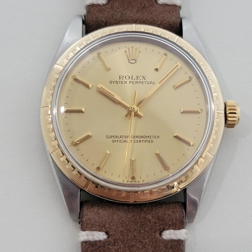 Timeless classic, Men's 14k gold and stainless steel Rolex Oyster Perpetual 1038 automatic, c.1968, in excellent working condition. Verified authentic by a master watchmaker. Gorgeous Rolex signed dial, applied baton index hour markers, gilt minute