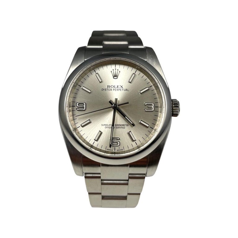 Rolex Oyster Perpetual Ref. 116000 Cream Dial with Arabic Numerals