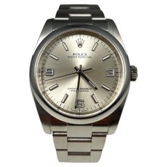 Rolex Oyster Perpetual Ref. 116000 Cream Dial with Arabic Numerals