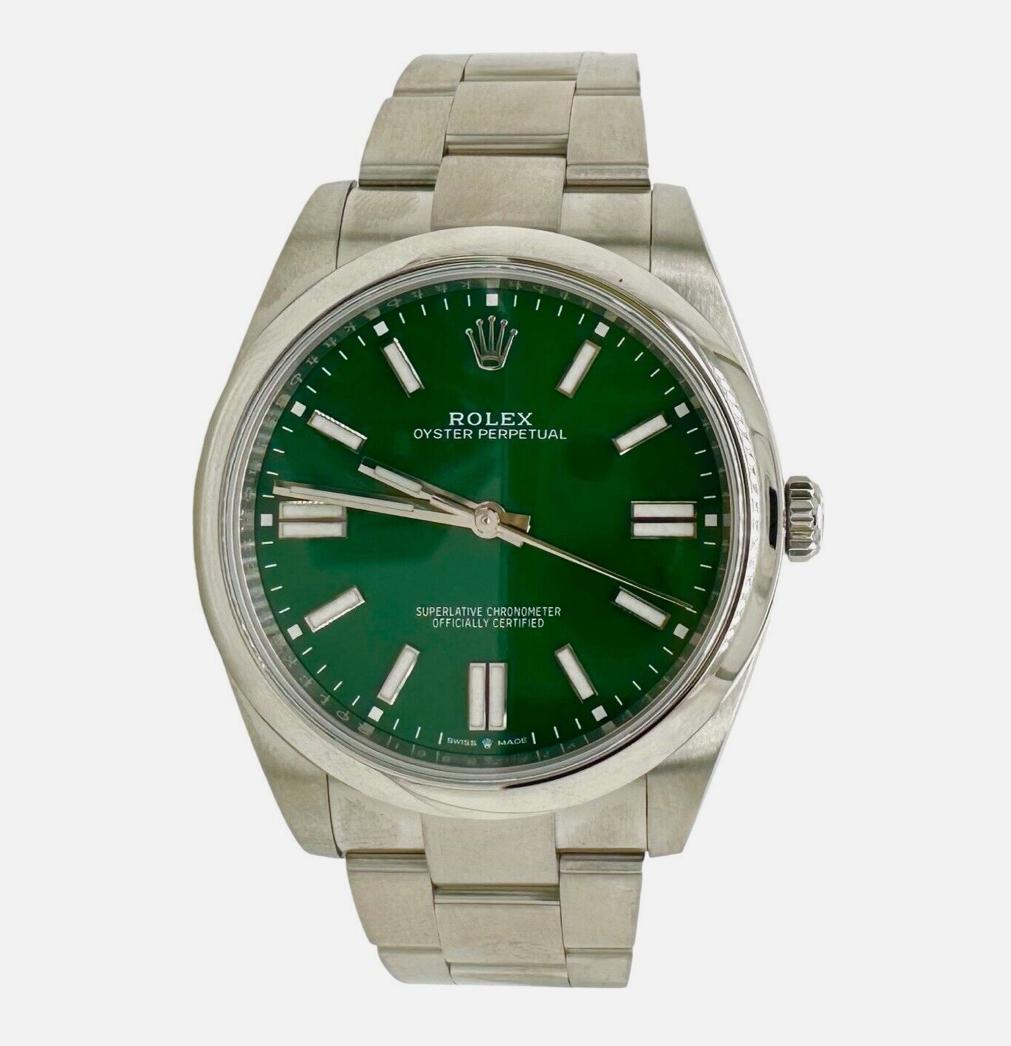 Brand: Rolex

Model: Oyster Perpetual

Ref: 124300

Size: 41mm

Metal: Stainless Steel

Dial: Green

Bezel: Smooth

Includes: Rolex Box
                Rolex Certificate
                24 Months Brilliance Jewels warranty