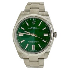 Rolex Oyster Perpetual Ref. 124300 Stahl-Uhr mit grünem Zifferblatt, 41 mm NEU