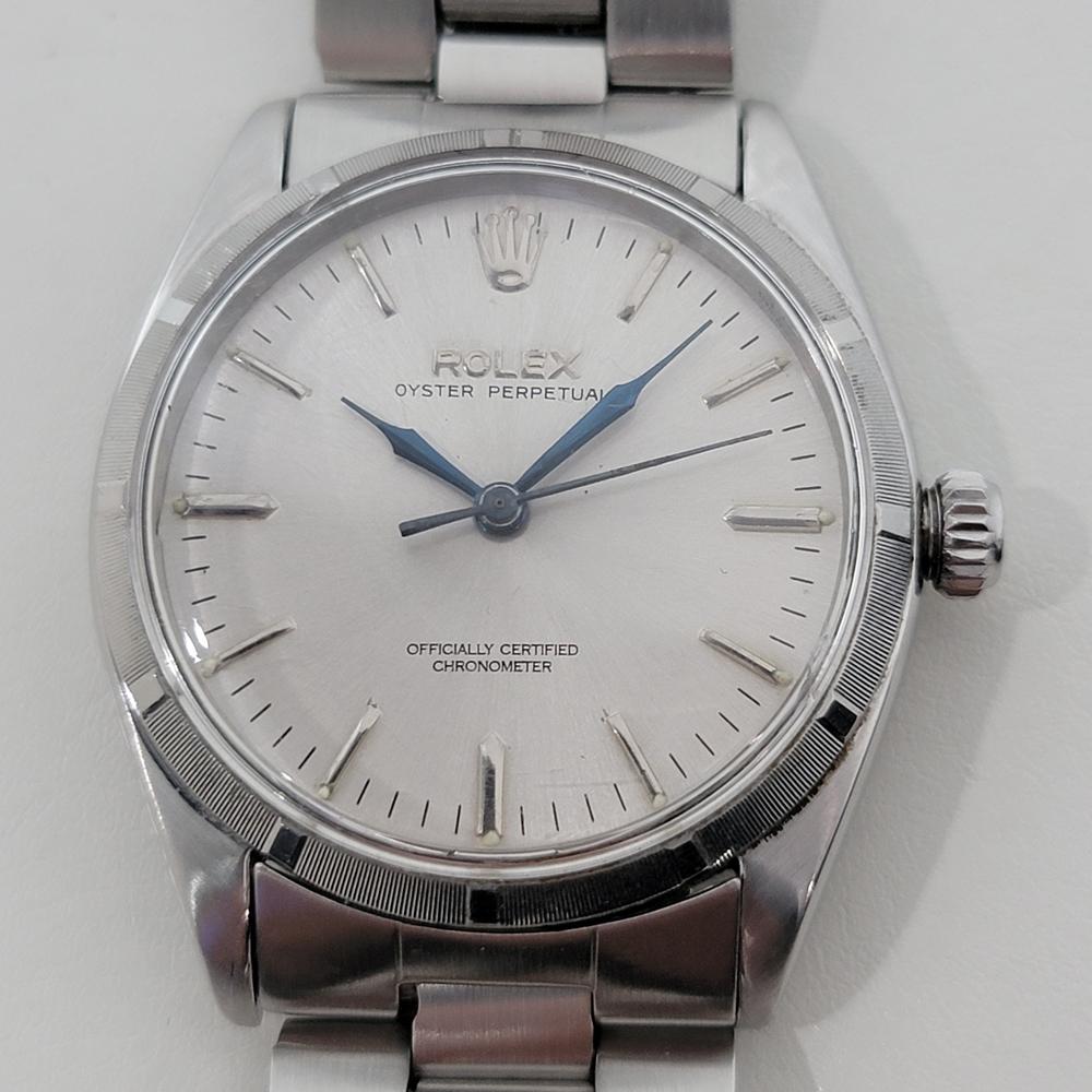 Timeless classic, Men's all-stainless steel Rolex Oyster Perpetual 6565 automatic dress watch, c.1957, in excellent working condition. Verified authentic by a master watchmaker. Gorgeous Rolex signed dial, applied baton index hour markers, stunning,