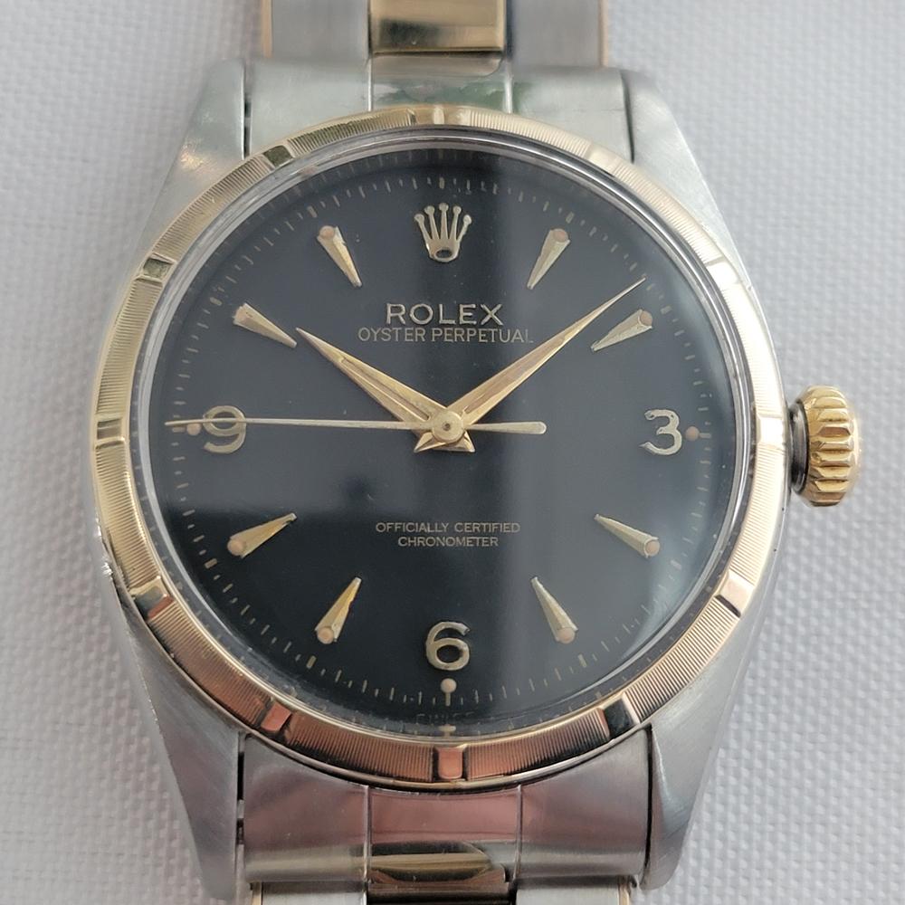 Timeless luxury classic, 14k Gold and stainless steel Men's Rolex Ref.6581 Oyster perpetual, c.1964, all original, in excellent working condition. Verified authentic by a master watchmaker. Gorgeous Rolex signed black dial, applied dagger and Arabic