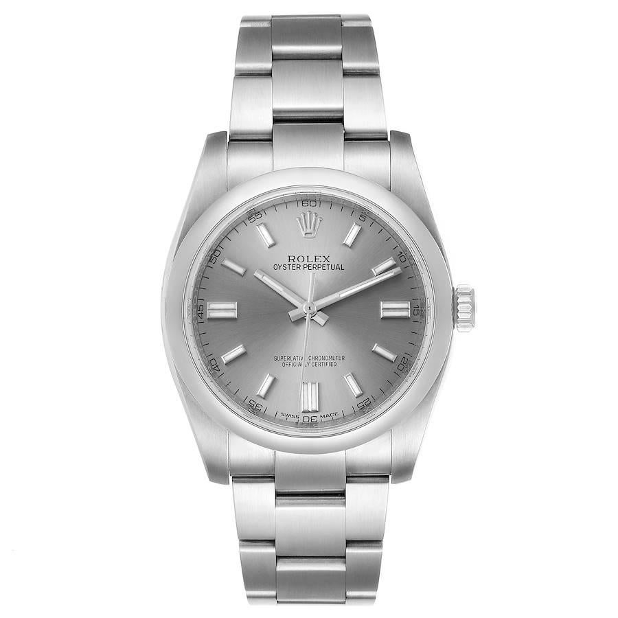 Rolex Oyster Perpetual Rhodium Dial Steel Mens Watch 116000 Box Card. Officially certified chronometer self-winding movement. Stainless steel case 36.0 mm in diameter. Rolex logo on a crown. Stainless steel smooth domed bezel. Scratch resistant