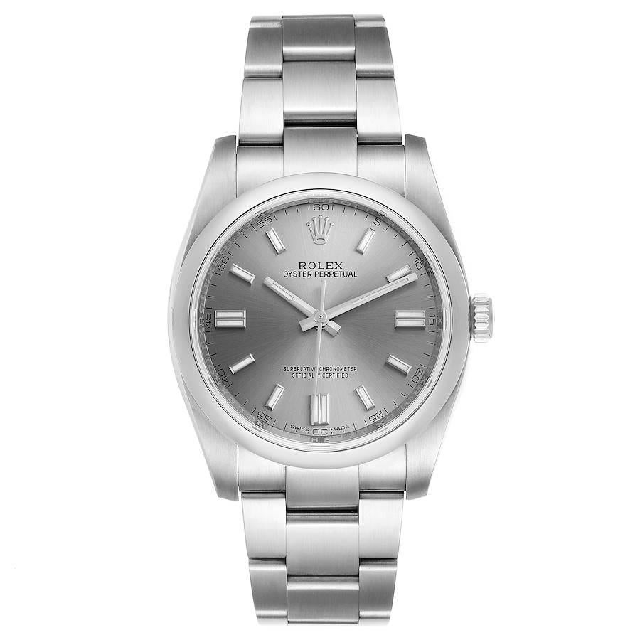 Rolex Oyster Perpetual Rhodium Dial Steel Mens Watch 116000 Unworn. Officially certified chronometer self-winding movement. Stainless steel case 36.0 mm in diameter. Rolex logo on a crown. Stainless steel smooth domed bezel. Scratch resistant