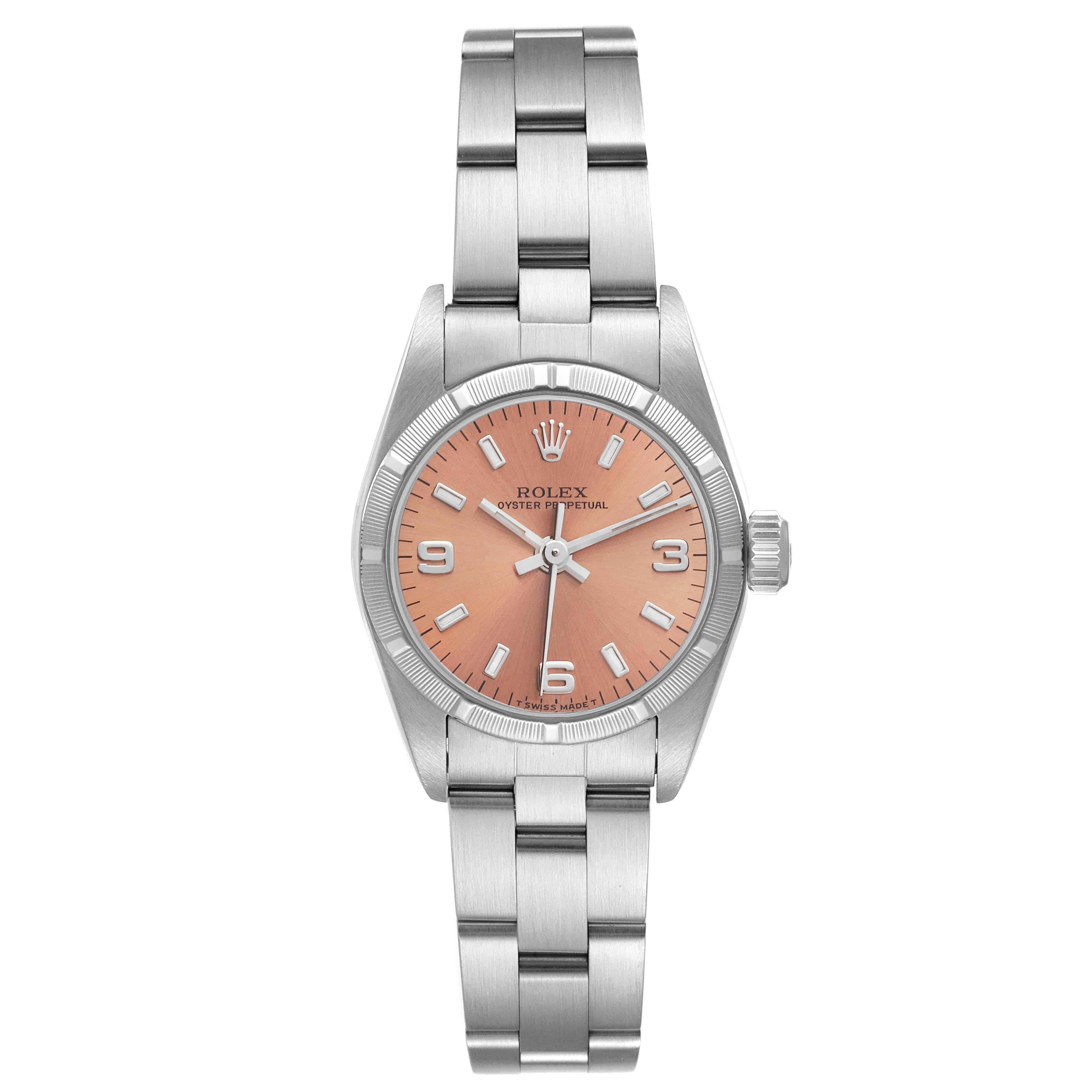 Rolex Oyster Perpetual Salmon Dial Oyster Bracelet Ladies Watch 67230 Box Papers. Officially certified chronometer automatic self-winding movement. Stainless steel oyster case 24.0 mm in diameter. Rolex logo on the crown. Stainless steel engine