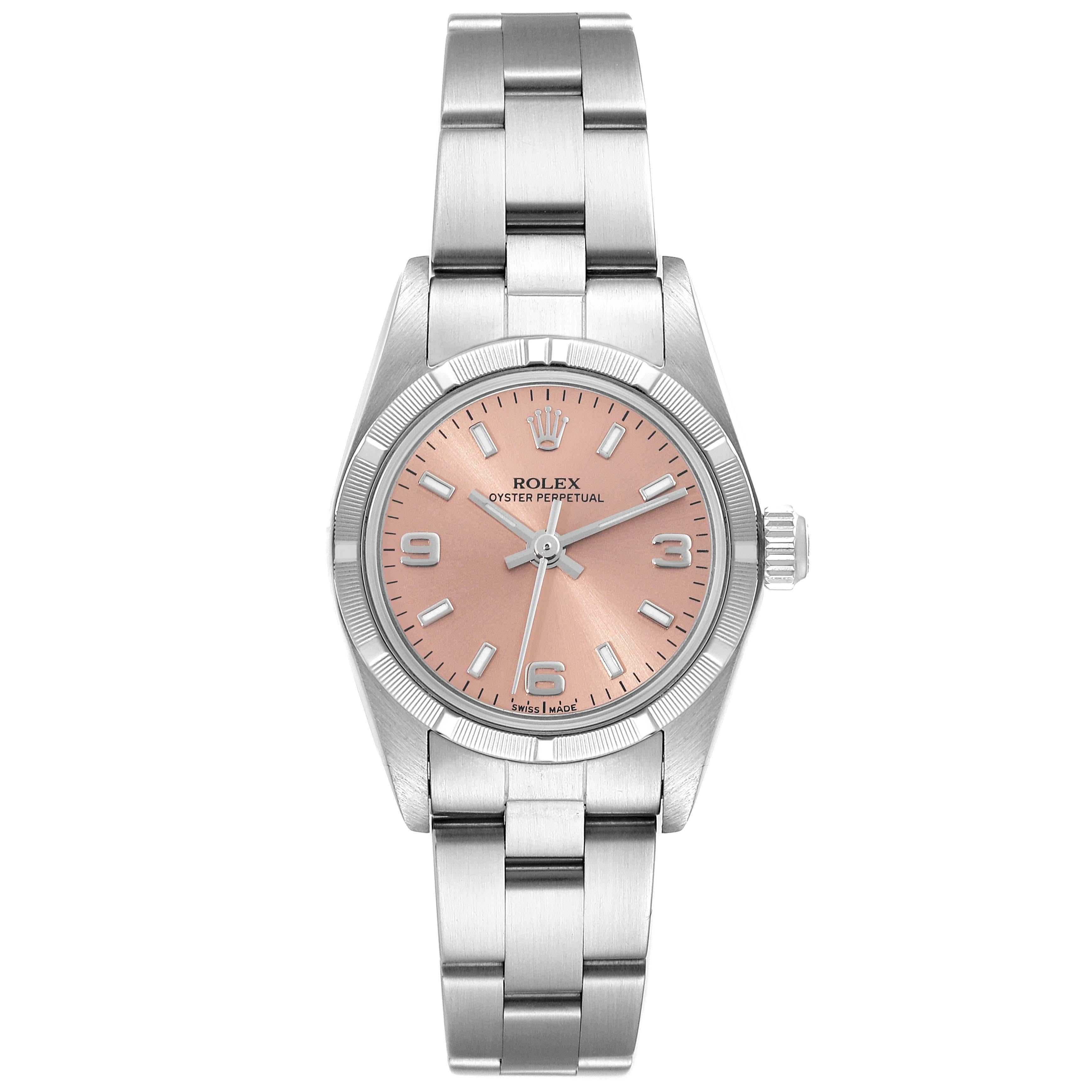 Rolex Oyster Perpetual Salmon Dial Steel Ladies Watch 76030. Officially certified chronometer automatic self-winding movement. Stainless steel oyster case 24.0 mm in diameter. Rolex logo on the crown. Stainless steel engine turned bezel. Scratch
