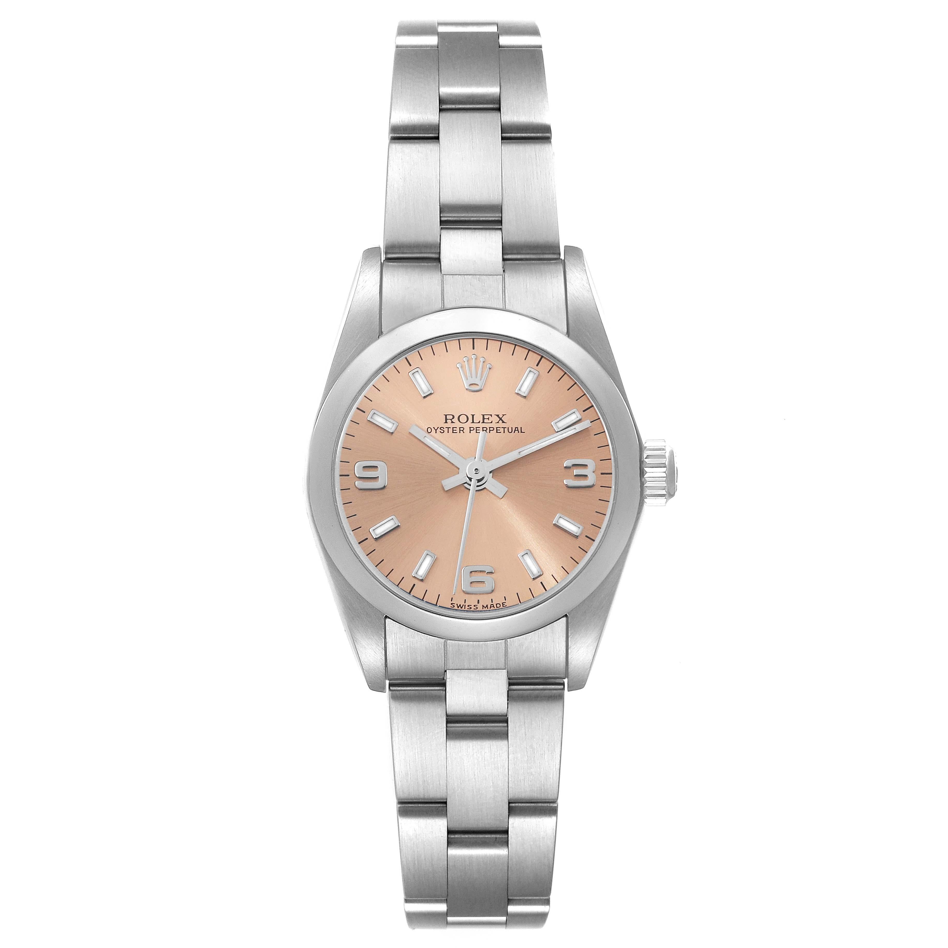 Rolex Oyster Perpetual Salmon Dial Steel Ladies Watch 76080 Box Papers. Officially certified chronometer automatic self-winding movement. Stainless steel oyster case 24.0 mm in diameter. Rolex logo on the crown. Stainless steel smooth bezel. Scratch