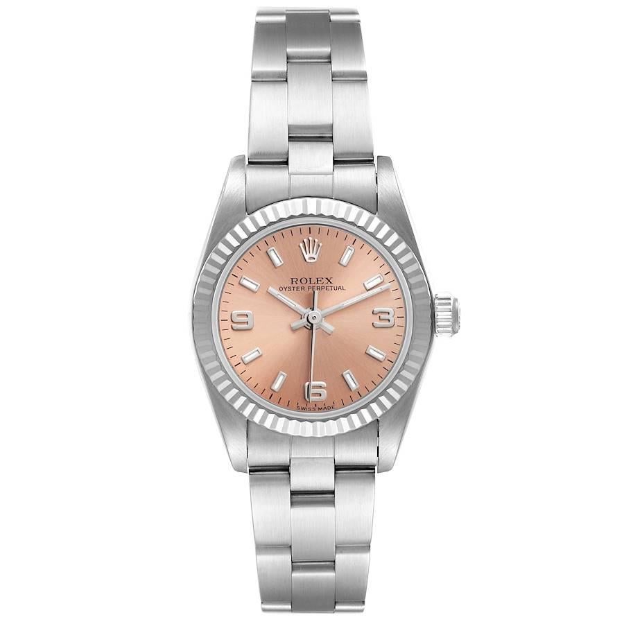Rolex Oyster Perpetual Lachs Zifferblatt Stahl Weißgold Damenuhr 76094. Offiziell zertifiziertes Chronometerwerk mit automatischem Aufzug. Austerngehäuse aus Edelstahl mit einem Durchmesser von 24,0 mm. Rolex Logo auf einer Krone. Geriffelte Lünette